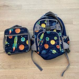 Pottery Barn navy blue kids space rocket backpack and lunchbox.